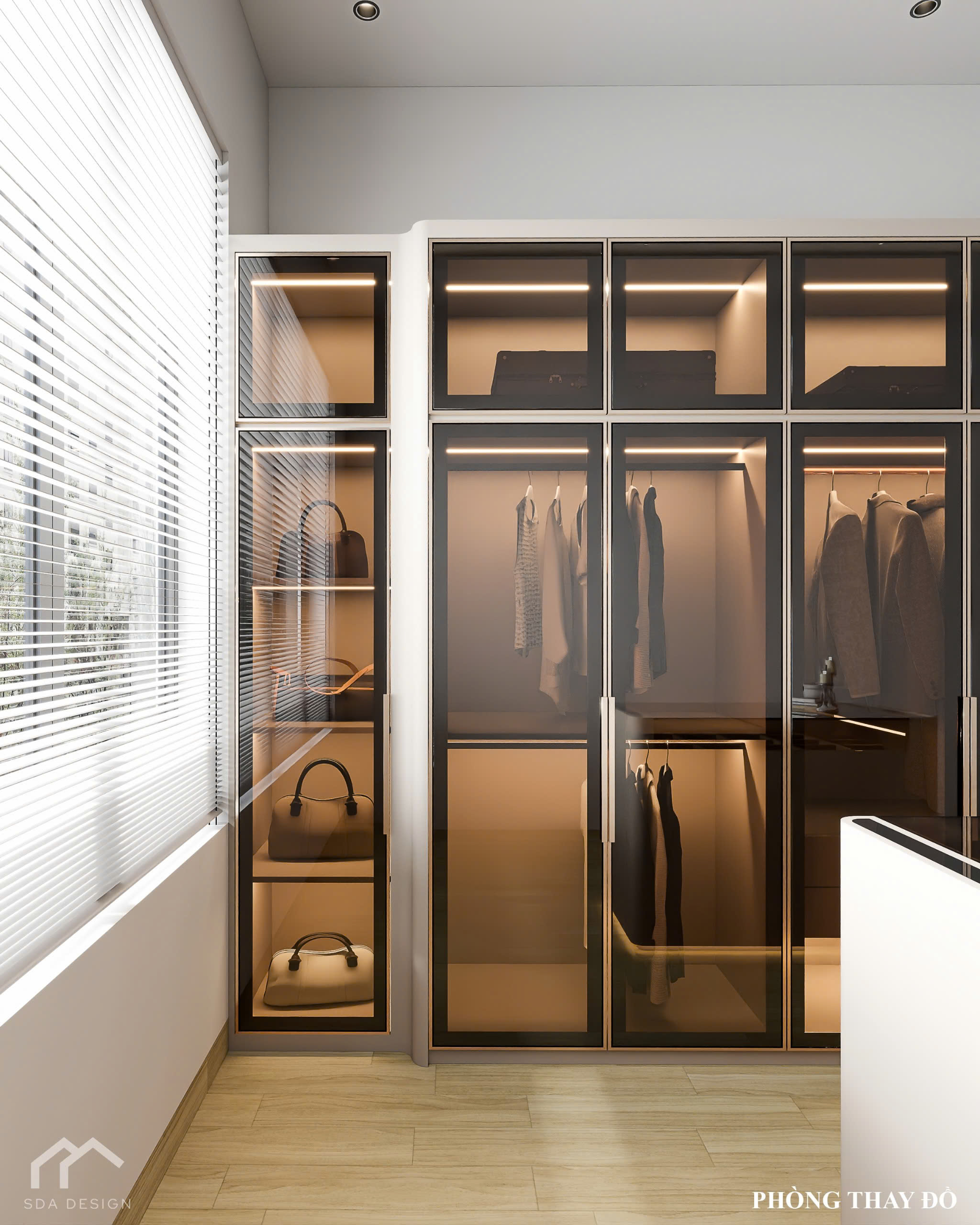 Tủ quần áo cánh kính sang trọng, tích hợp đèn LED và bàn đảo lưu trữ trung tâm.